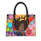 Tote bag featuring graffiti-style Afrocentric artwork, designed with black handles Yoycol